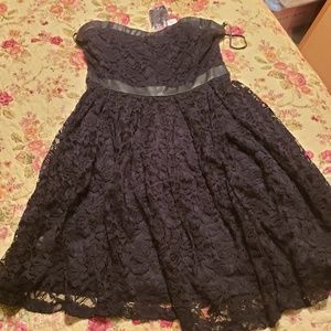 Black cocktail and/or party dress. New with tags.